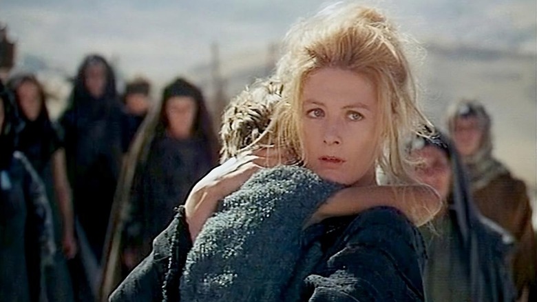 Vanessa Redgrave as Andromache holding her son in The Trojan Women