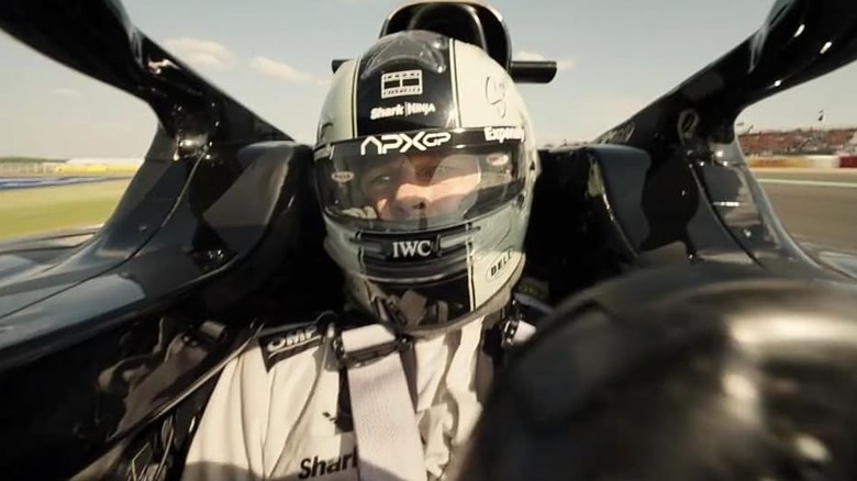 Brad Pitt as Sonny in the cockpit of his car on the F1 track