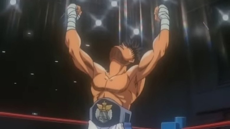 Ippo raises his hands celebrating becoming champion in Hajime no Ippo