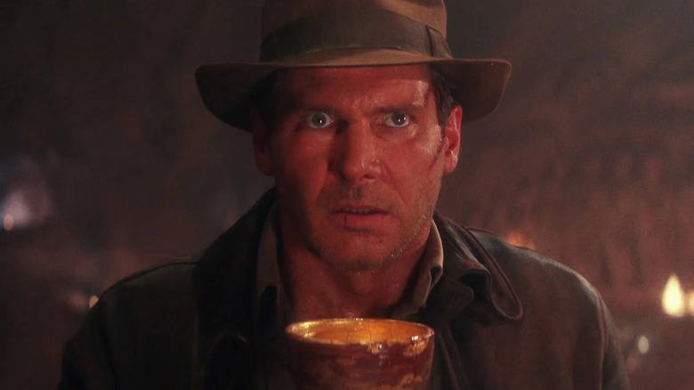 Harrison Ford as Indiana Jones with the Holy Grail in Indiana Jones and The Last Crusade