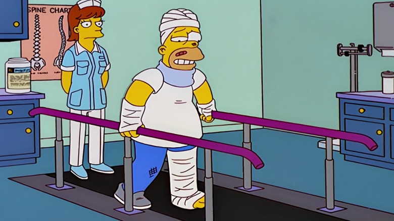 Bandaged Homer does physical therapy