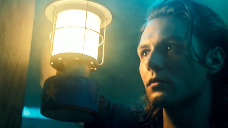 Dalton holding lantern