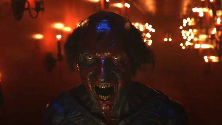 The demon bares his teeth