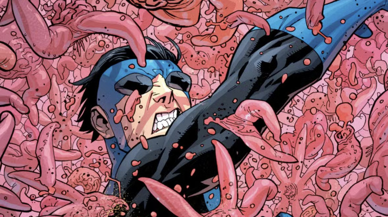 Invincible comics - Invincible punching crowd of Sequids