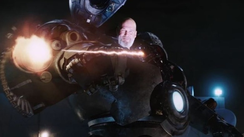 Obadia Stan smiles at iron shield in iron in the iron man