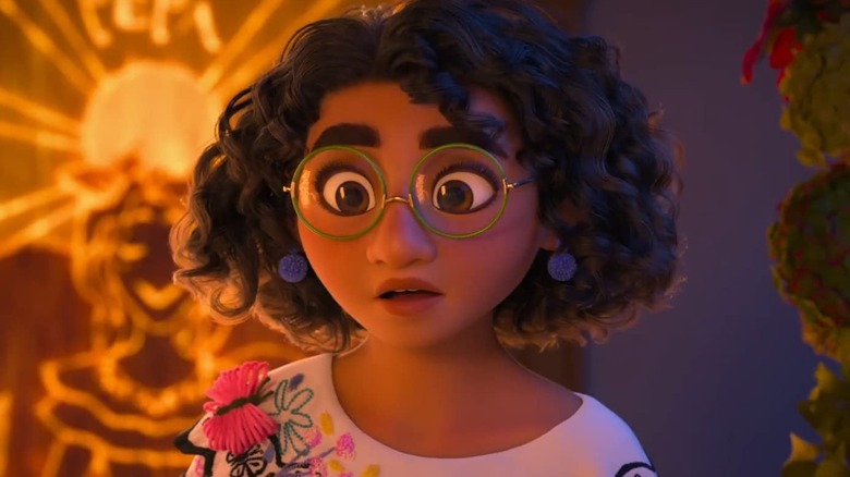 Mirabel with a wide-eyed look of surprise on her face in Encanto