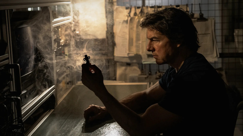 Ethan Hunt looks at the key in the mission: impossible - the final account
