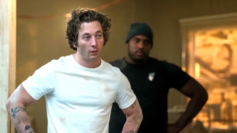 Carmy and Marcus standing around with their hands on their hips in The Bear