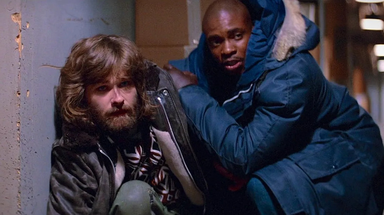 Kurt Russell and Keith David in The Thing
