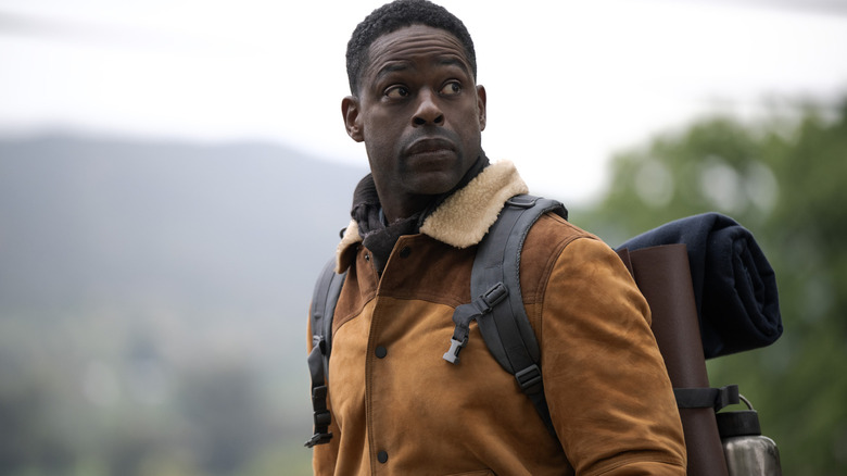 Sterling K. Brown as Xavier Collins wearing hiking gear in the wilderness in Paradise season 2