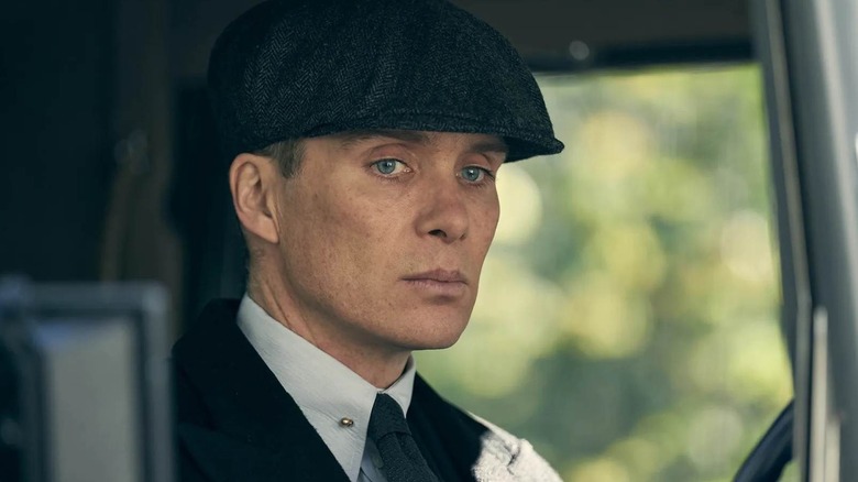 Tommy Shelby sitting in a car in Peaky Blinders