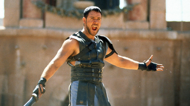 Maximus (Russell Crowe) with sword, shouting in Gladiator