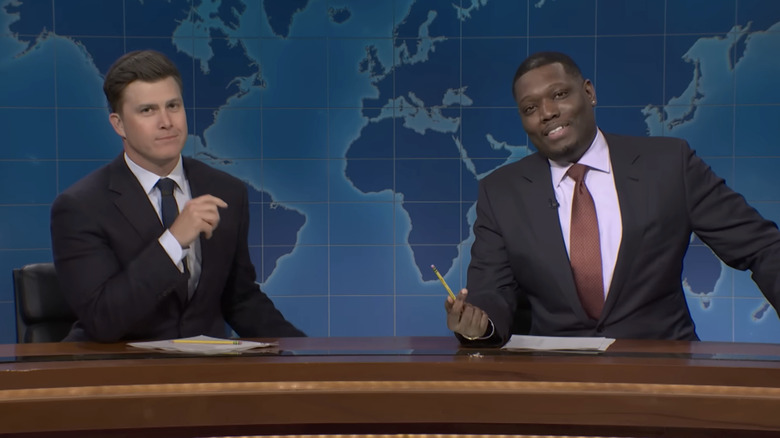 Colin Jost and Michael Che at the Weekend Update desk on SNL