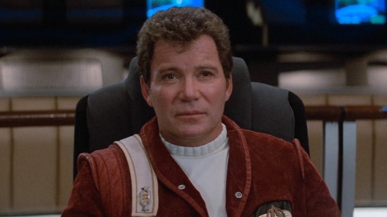 Close up of Kirk in captain's chair