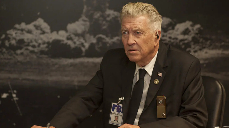 Gordon Cole in front of a picture of a bomb in Twin Peaks