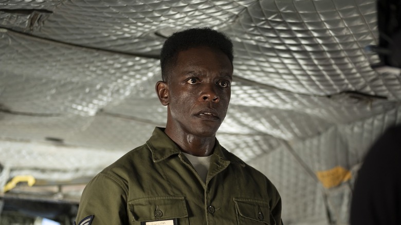 Chris Chalk's Dick Hallorann looks worried as he stands in a plane in It Welcome to Derry.jpg