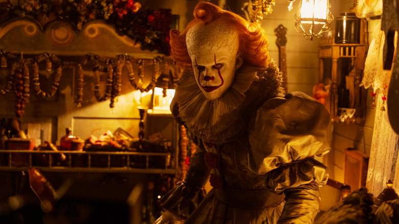 Bill Skarsgård as Pennywise looks angry and confused in It: Welcome to Derry