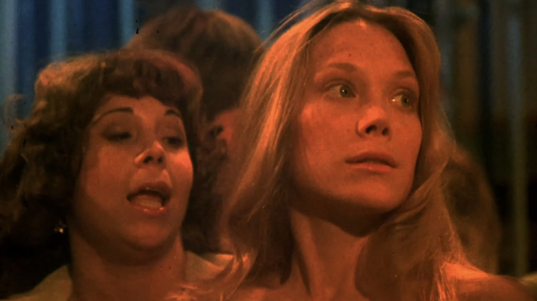 Sissy Spacek's Carrie White looks off to her left in Carrie