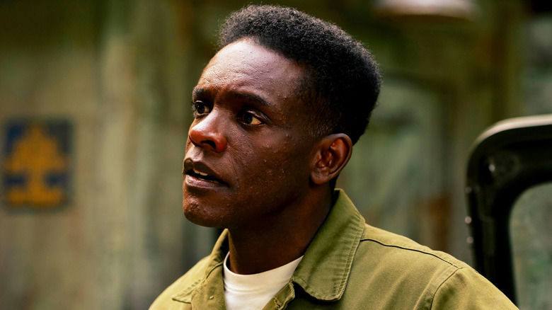 Chris Chalk's Dick Hallorann is seen in closeup as he stands outside in It Welcome to Derry