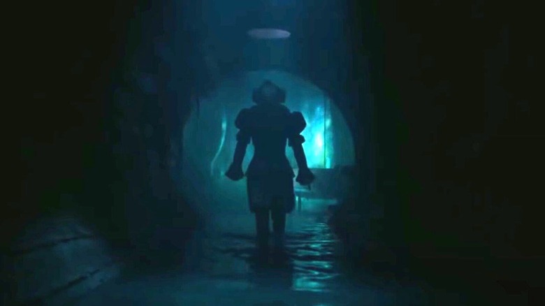 Pennywise standing in the sewers in "It: Welcome to Derry"