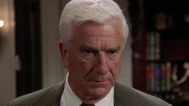 Frank Drebin looking down