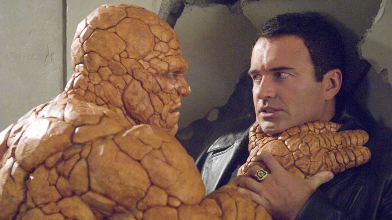 Michael Chiklis as The Thing grabbing Julian McMahon's Victor Von Doom by the throat in Fantastic Four (2005)