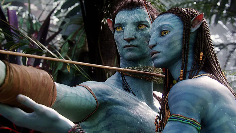 Jake and Neytiri preparing to shoot an arrow in Avatar