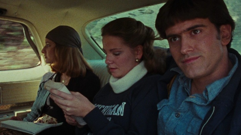 Linda Cheryl and Ash in the car in The Evil Dead