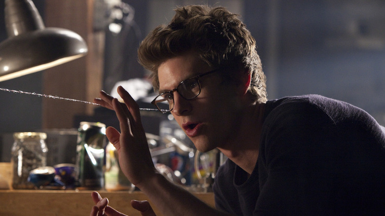 Peter playing with a web in The Amazing Spider-Man