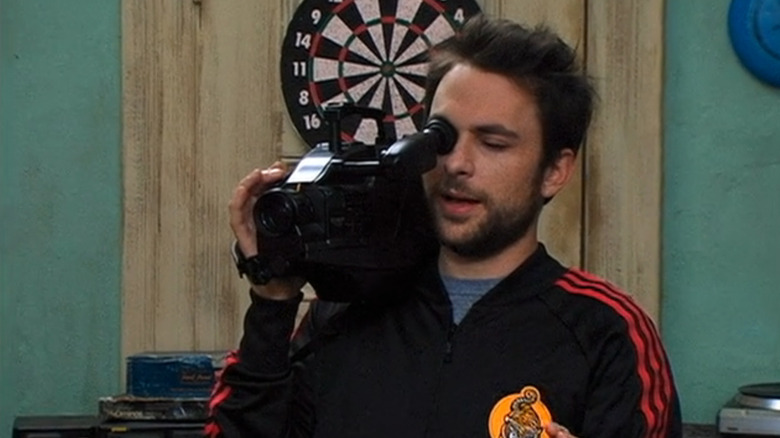Always sunny, Charlie holds camera in Dennis flat, filming video