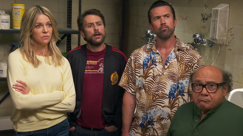 The cast of Always Sunny in a bathroom