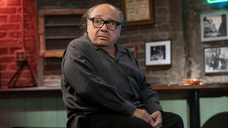 Danny DeVito as Frank Reynolds sitting in Paddy's Pub on It's Always Sunny in Philadelphia
