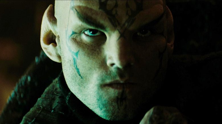 Nero, draped in shadows, staring intensely in Star Trek