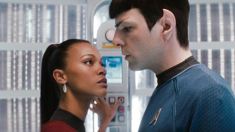 Zoe Saldana as Uhura and Zachary Quinto as Spock in Star Trek 2009