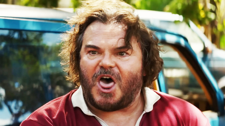Jack Black's Doug McCallister is seen in closeup as he sticks out his tongue in Anaconda