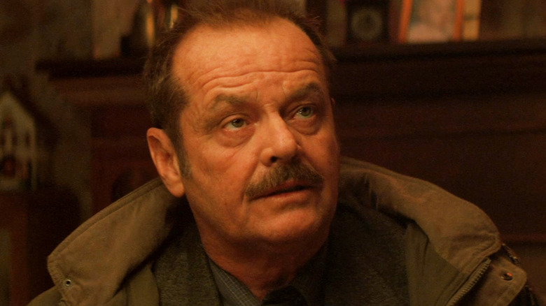 Jack Nicholson's Jerry Black looks up as he sits in a dining room in The Pledge