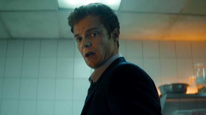 Jack Quaid's Nate during the kitchen fight in Novocaine