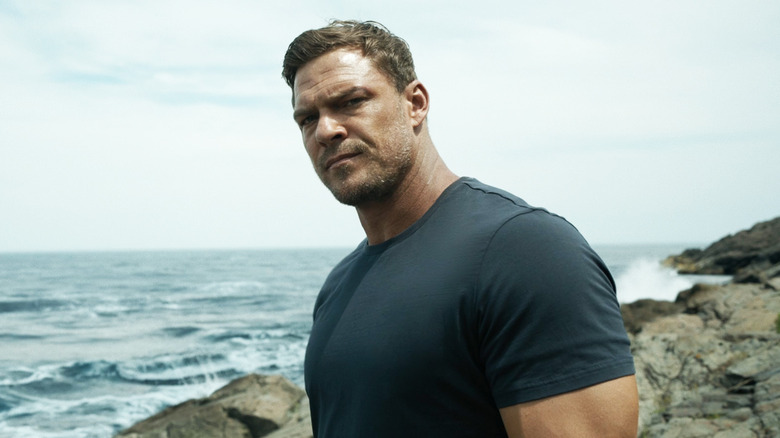 Alan Ritchson's Jack Reacher is seen in closeup in Reacher