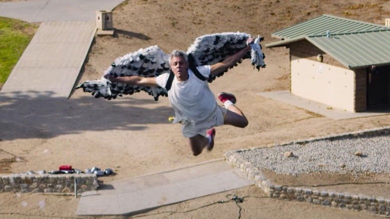 Johnny Knoxville flying like a very scared bird in Jackass Forever