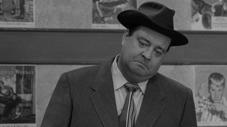 Ralph Kramden looking very upset in The Honeymooners