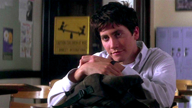 Jake Gyllenhaal sits at a desk in Donnie Darko