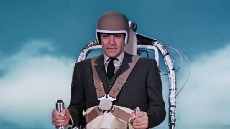 Sean Connery takes flight with a jet pack as James Bond in Thunderball