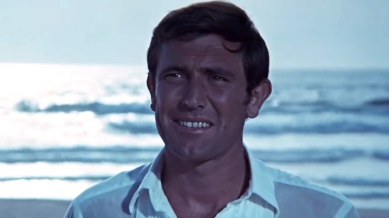 George Lazenby's James Bond looking confused in On Her Majesty's Secret Service