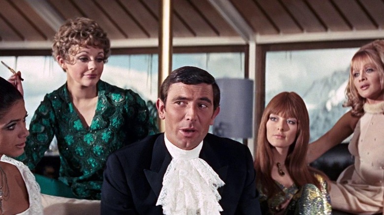 Bond surrounded by women
