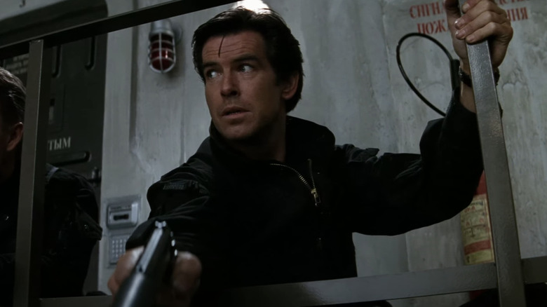Pierce Brosnan's James Bond points his pistol in GoldenEye