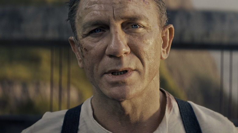 Daniel Craig's James Bond is seen in closeup in No Time to Die