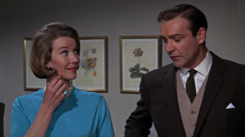 Miss Moneypenny and James Bond in an office in Goldfinger