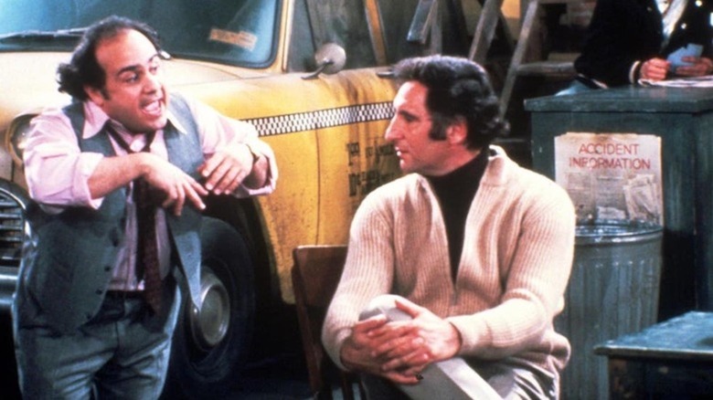 Danny DeVito as Louie De Palma browbeats Judd Hirsch as Alex Rieger in Taxi