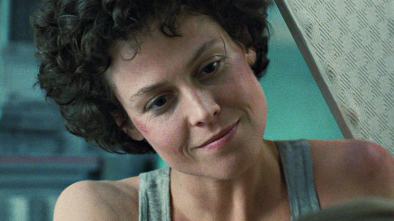 Sigourney Weaver's Ellen Ripley smiles in closeup in Aliens