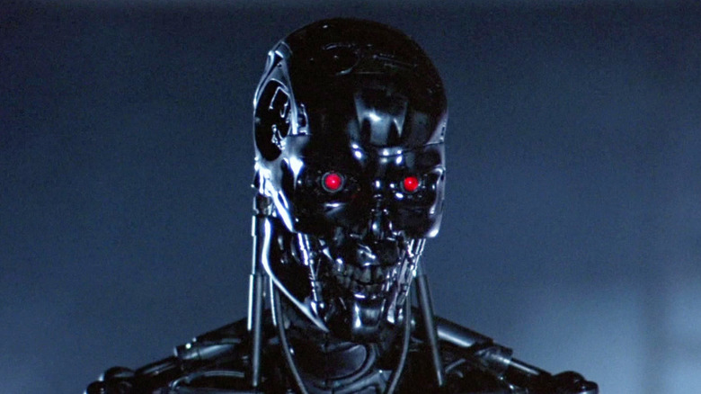 The T-800 staring with glowing red eyes in The Terminator